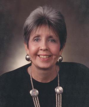 Carole A. Anderson portrait, smiling.