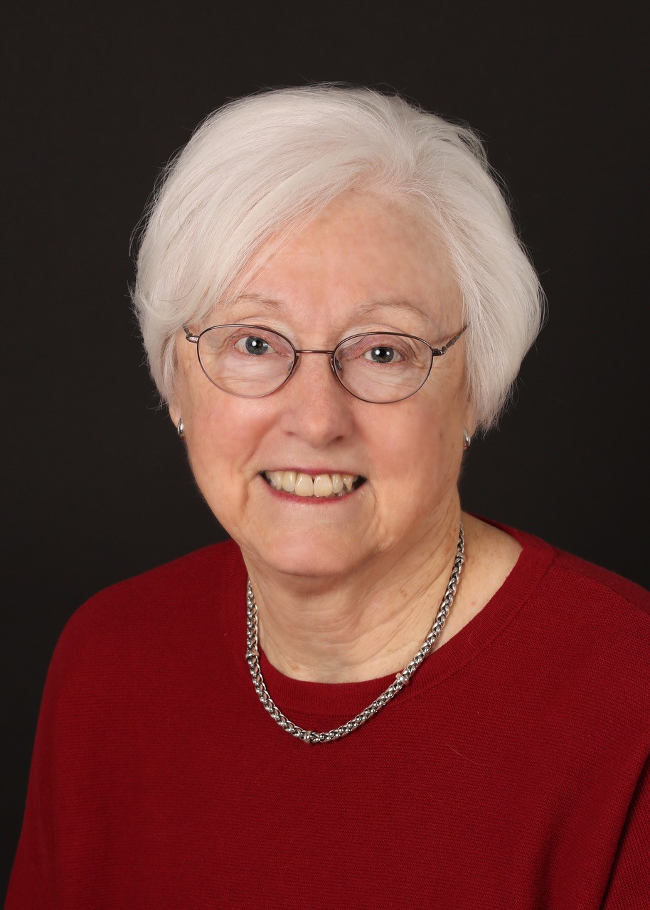Portrait of Carol Robinson, smiling.