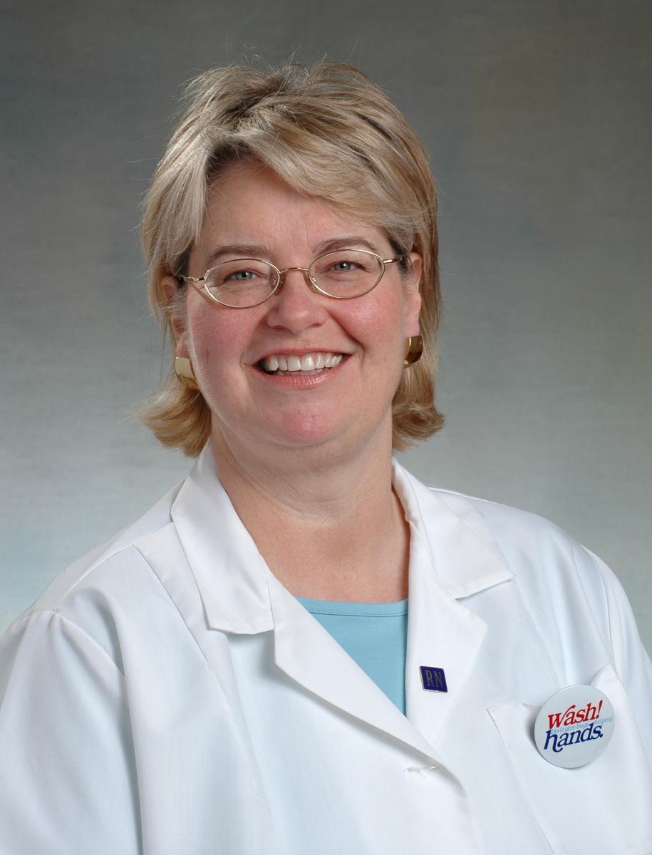 Deborah A. Coleman portrait, smiling.