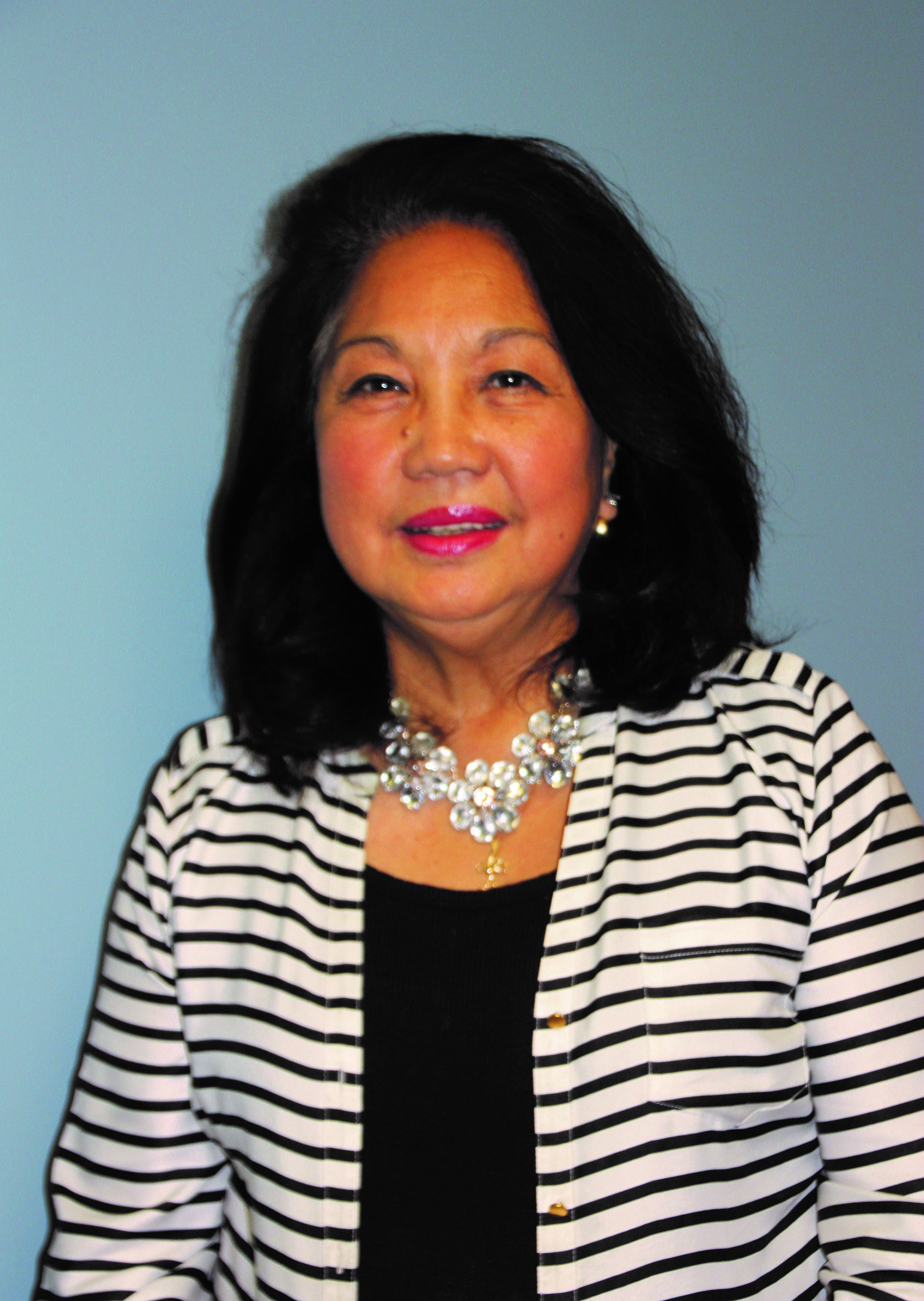 Corazon C. Munos portrait, smiling.