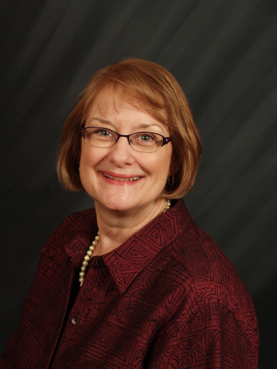 Debbie Cannon Freece portrait, smiling.