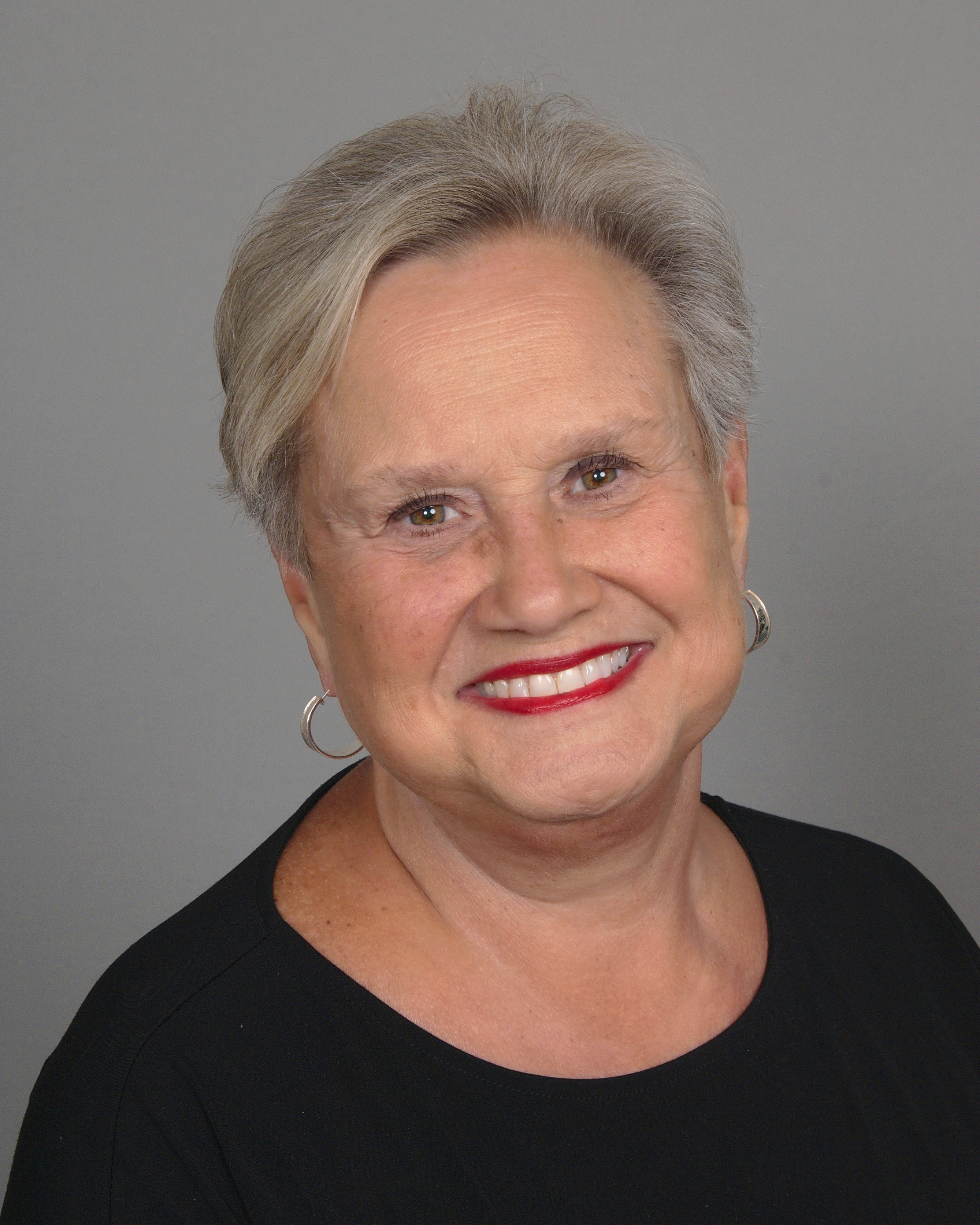 Portrait of Jude H. Gilliam, smiling.