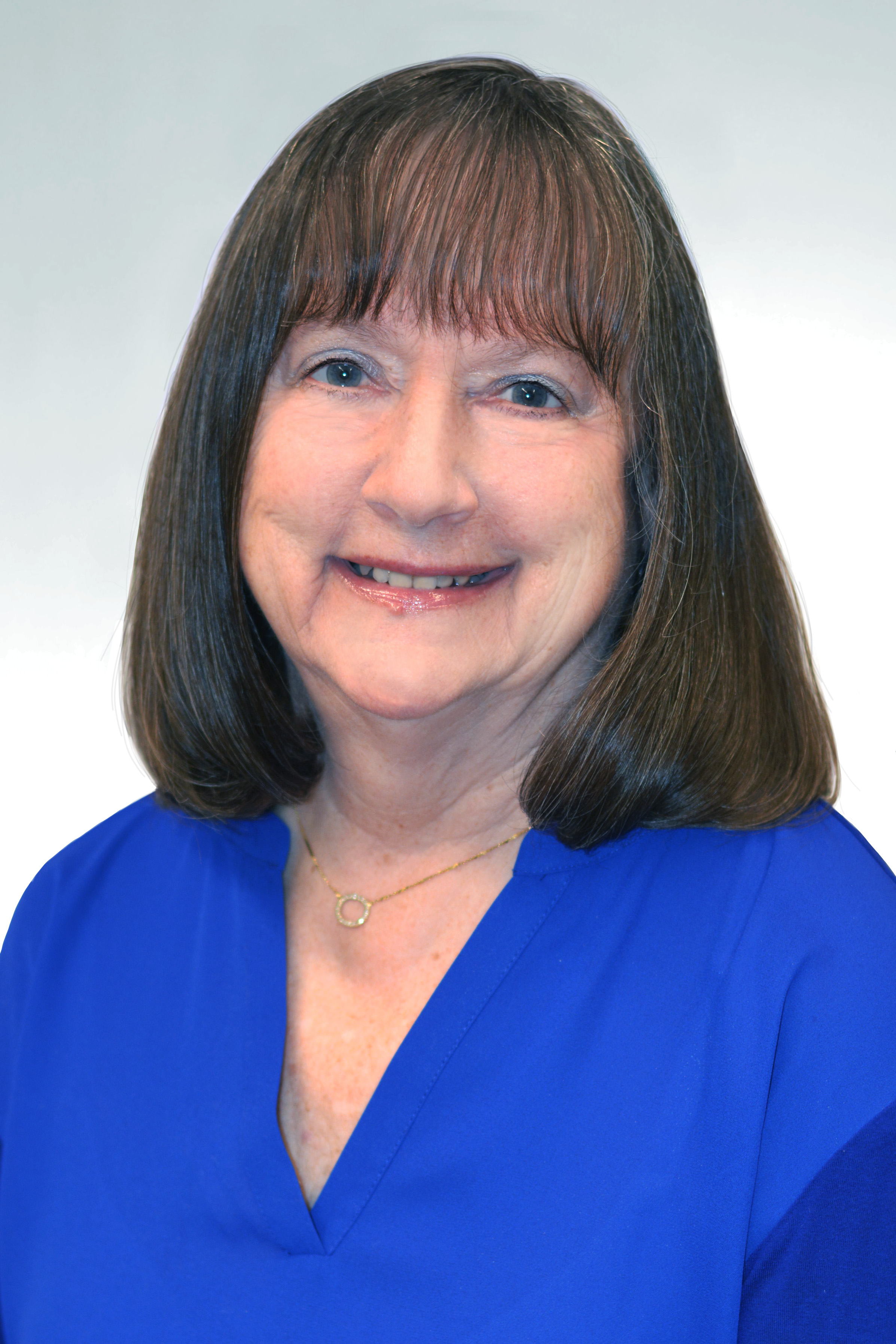 Nancy Rini portrait, smiling.