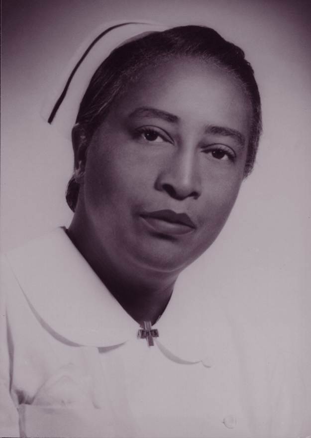 Portrait of Naomi James Evans, smiling.