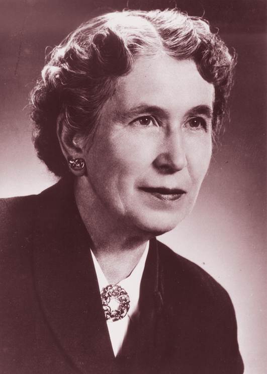 Portrait of Mildred Newton, smiling.