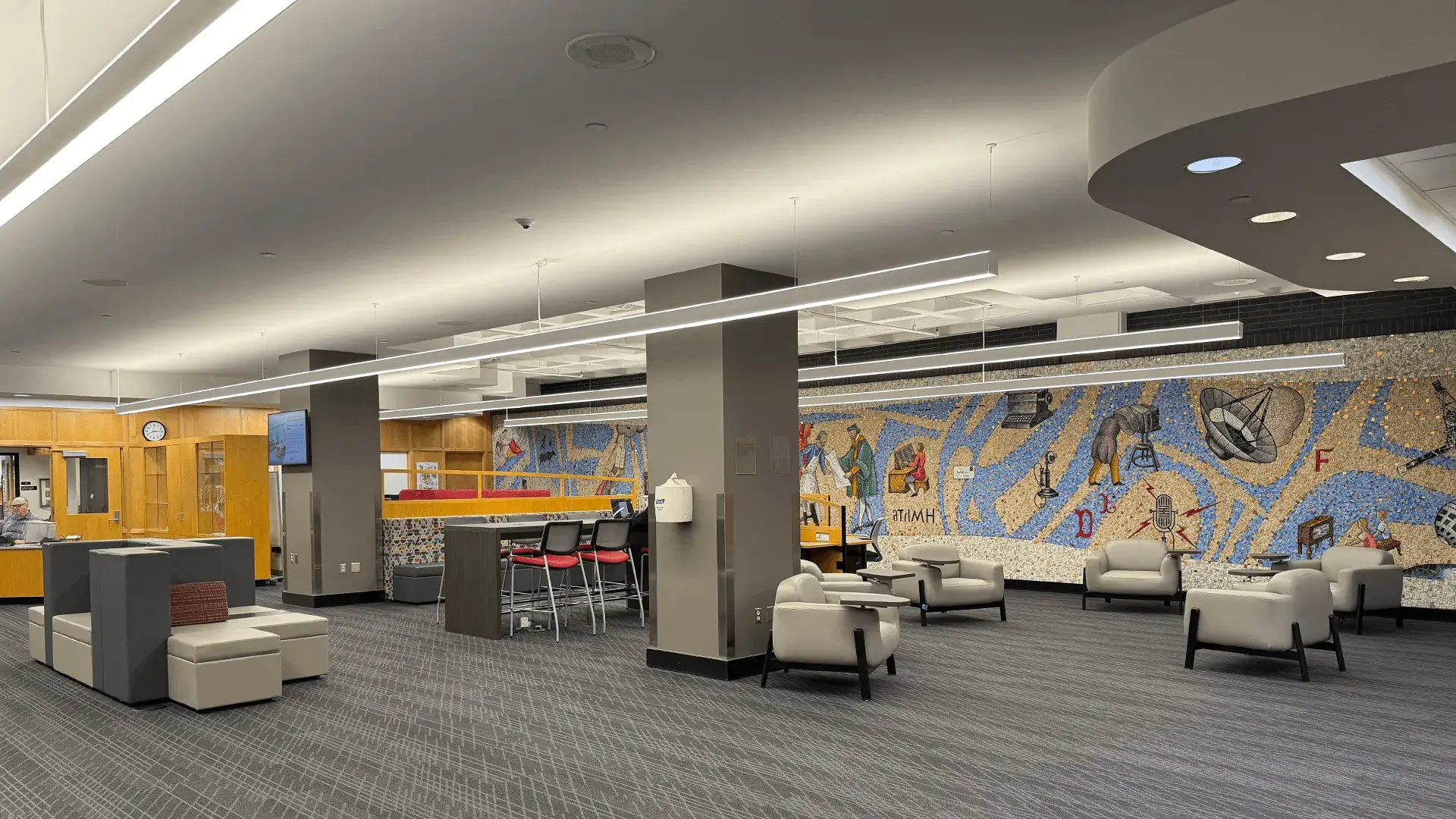 First floor interior showing seating areas and desks.