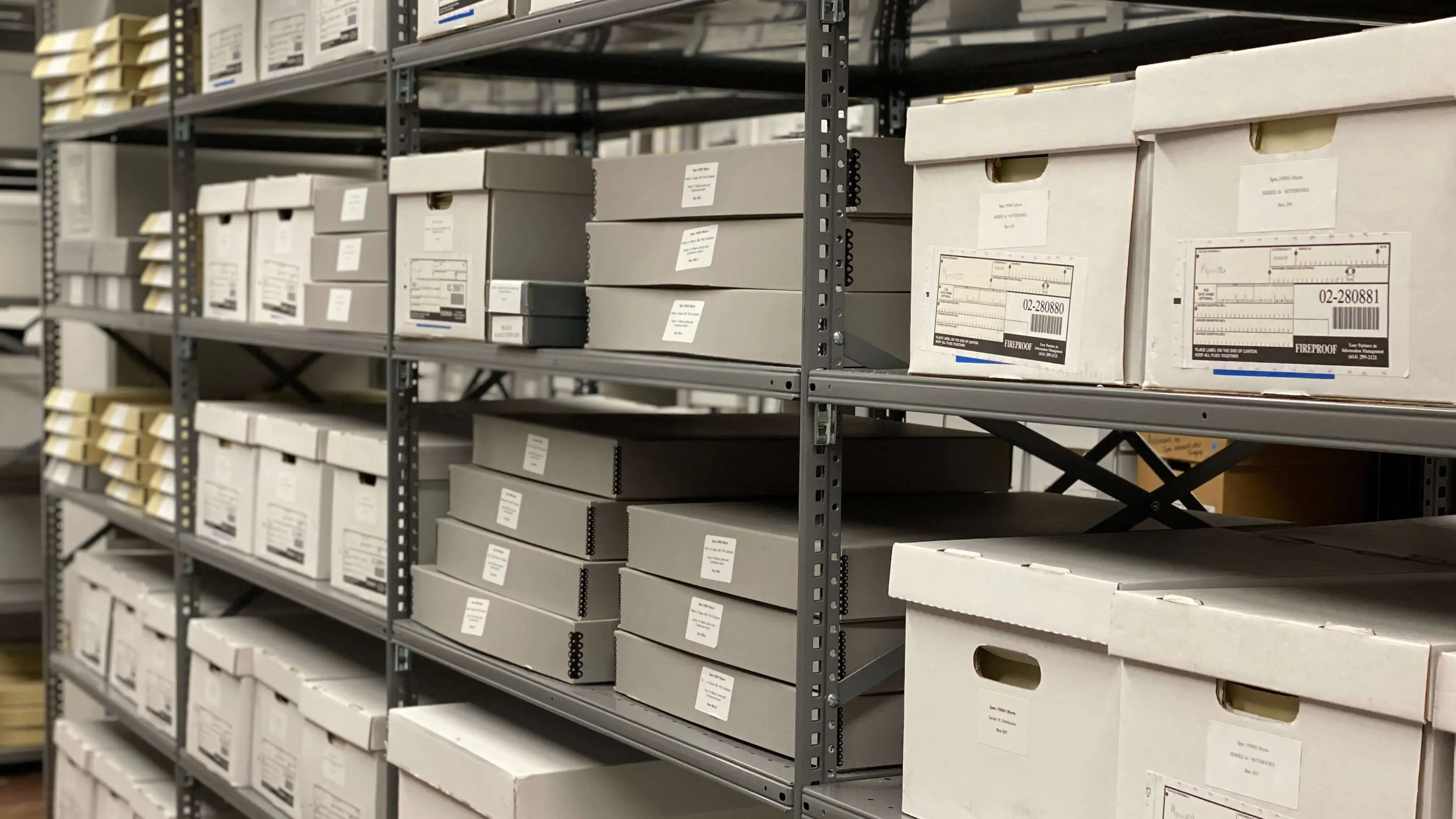 Archival shelves full of boxes.