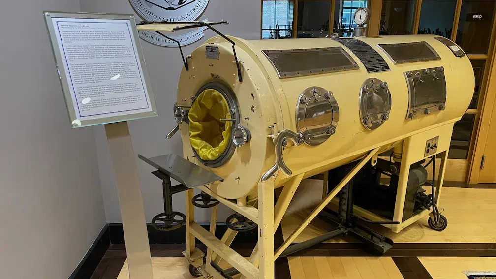 Close up of an Emerson Iron Lung on display at the Medical Heritage Center