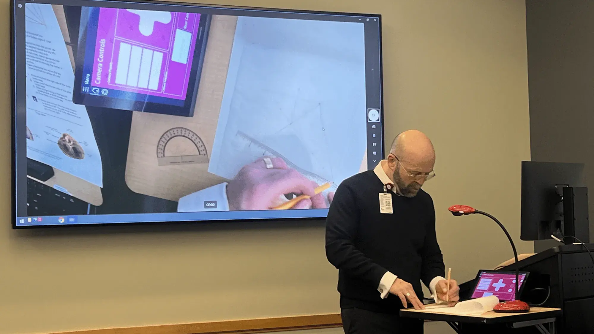 Anthony Baker instructs an anatomy drawing class