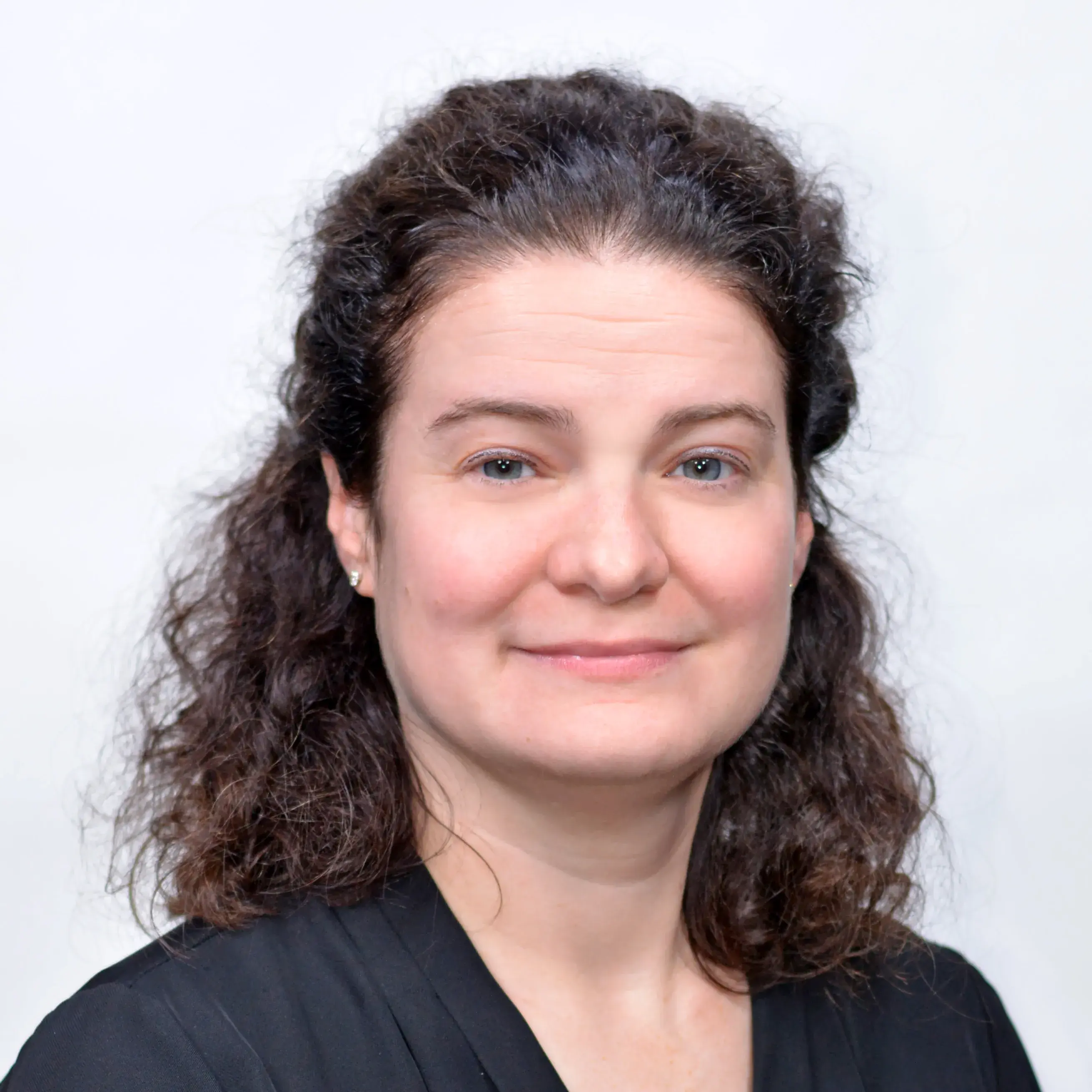 Headshot of Katie Blocksidge, smiling.