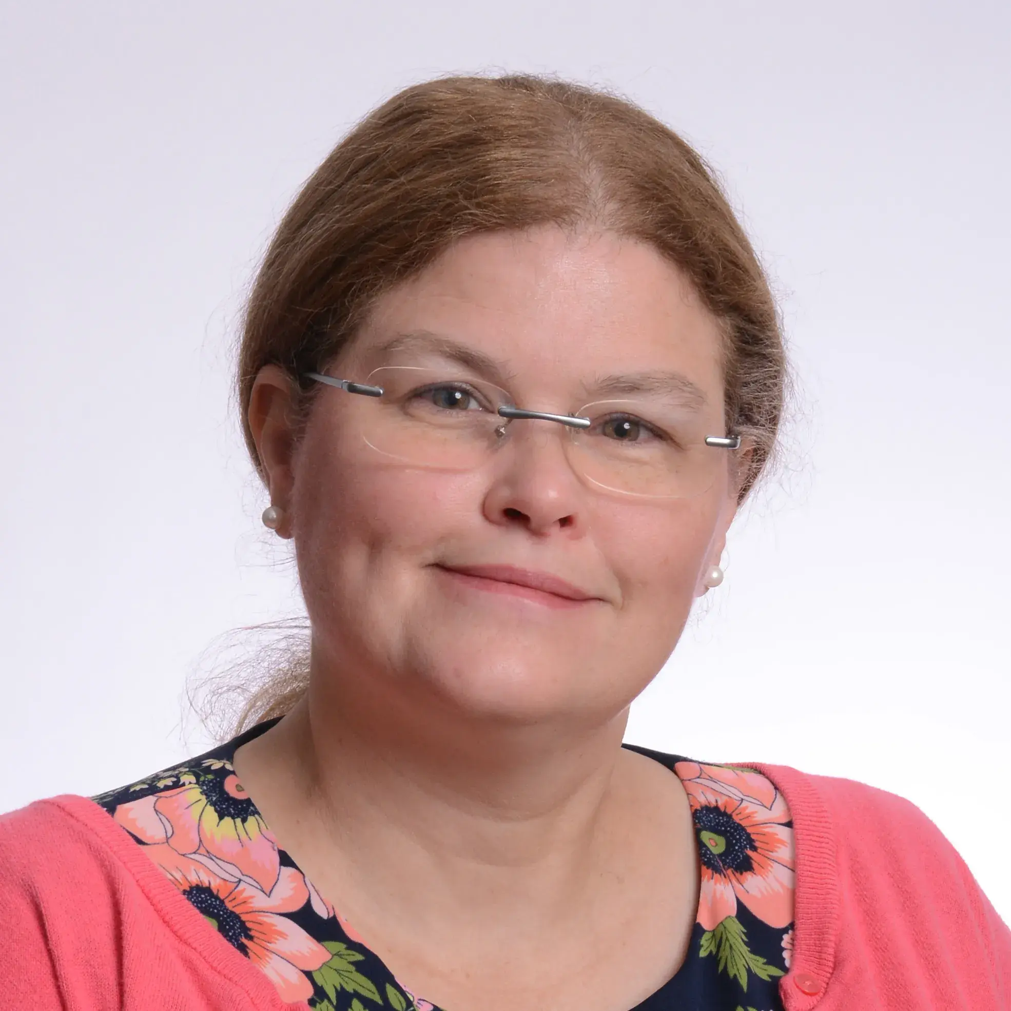 Kerry Dhakal, smiling.